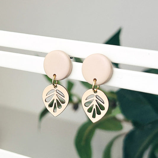 Small beige neutral stud and gold plated leaf earrings