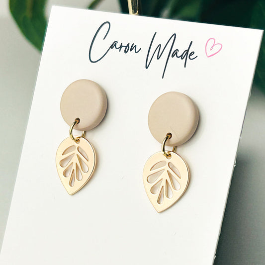 Small beige neutral stud and gold plated leaf earrings
