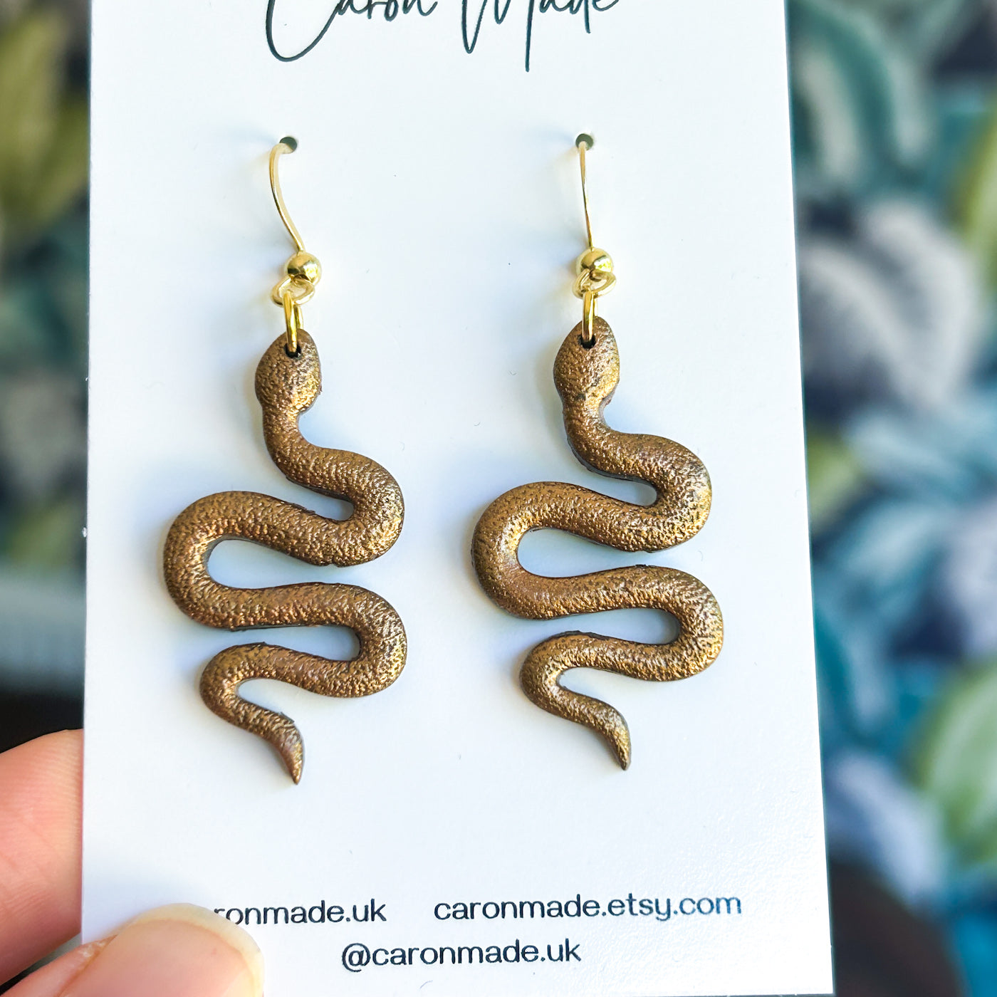 Golden brown snake earrings