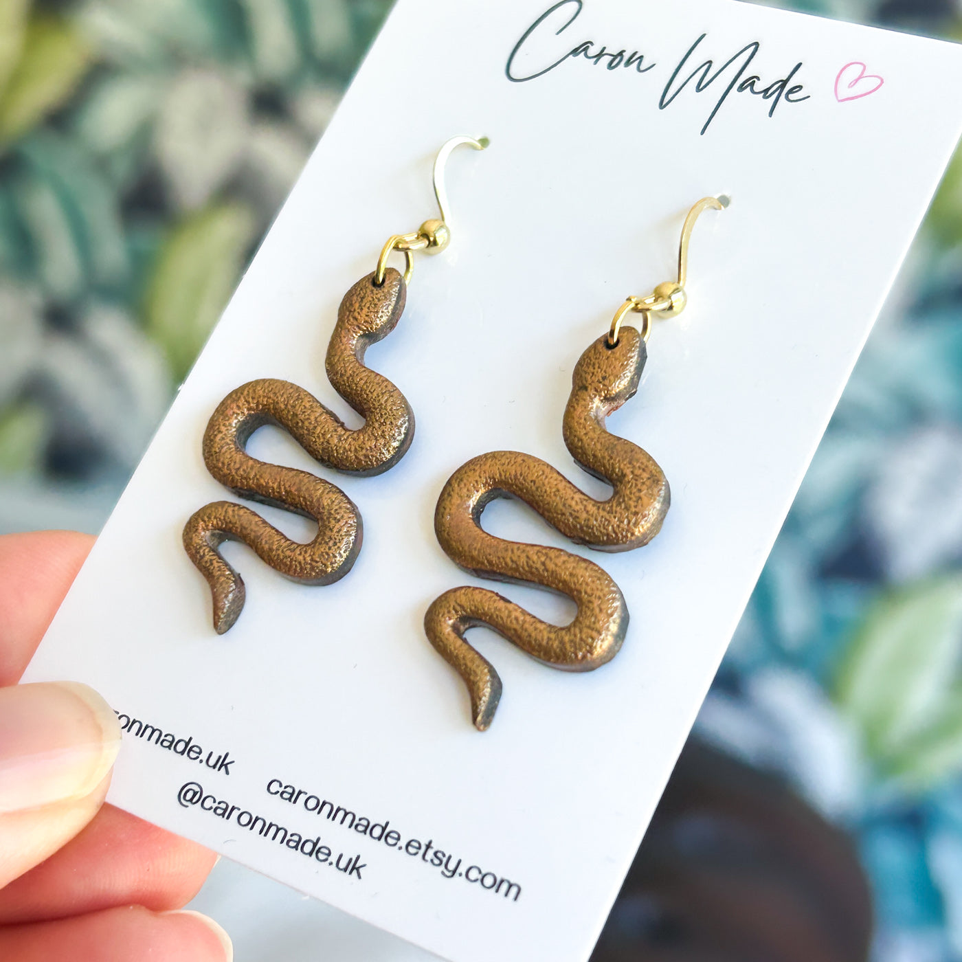 Golden brown snake earrings