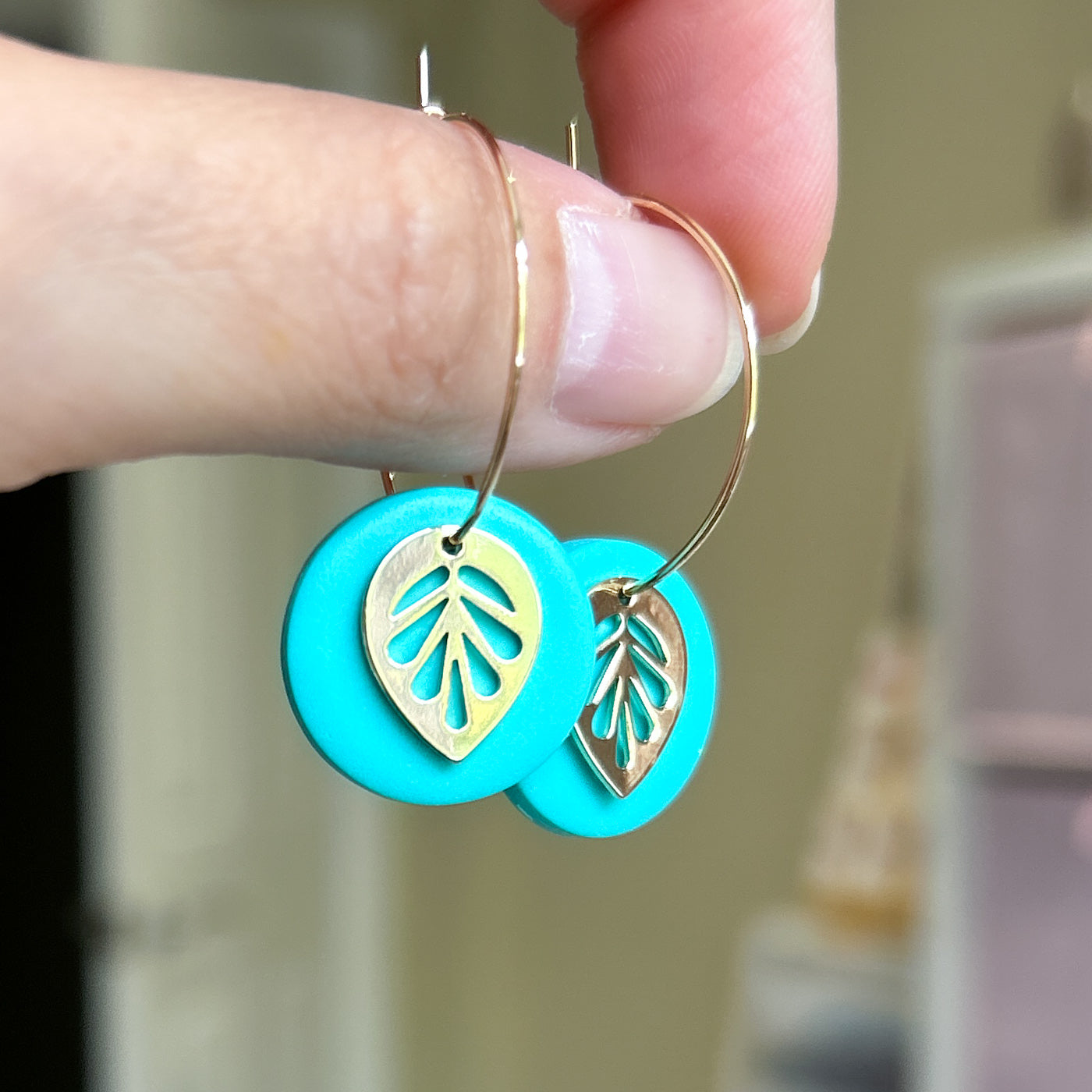 Hoop earrings with turquoise and leaf charm