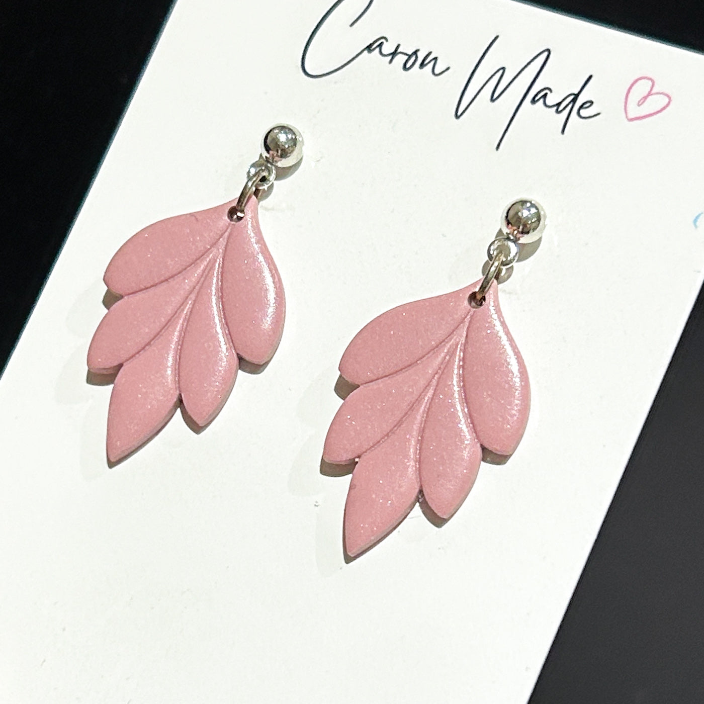 Blush pink floral shape earrings with silver stud