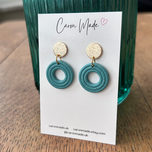 Blue and gold round earrings