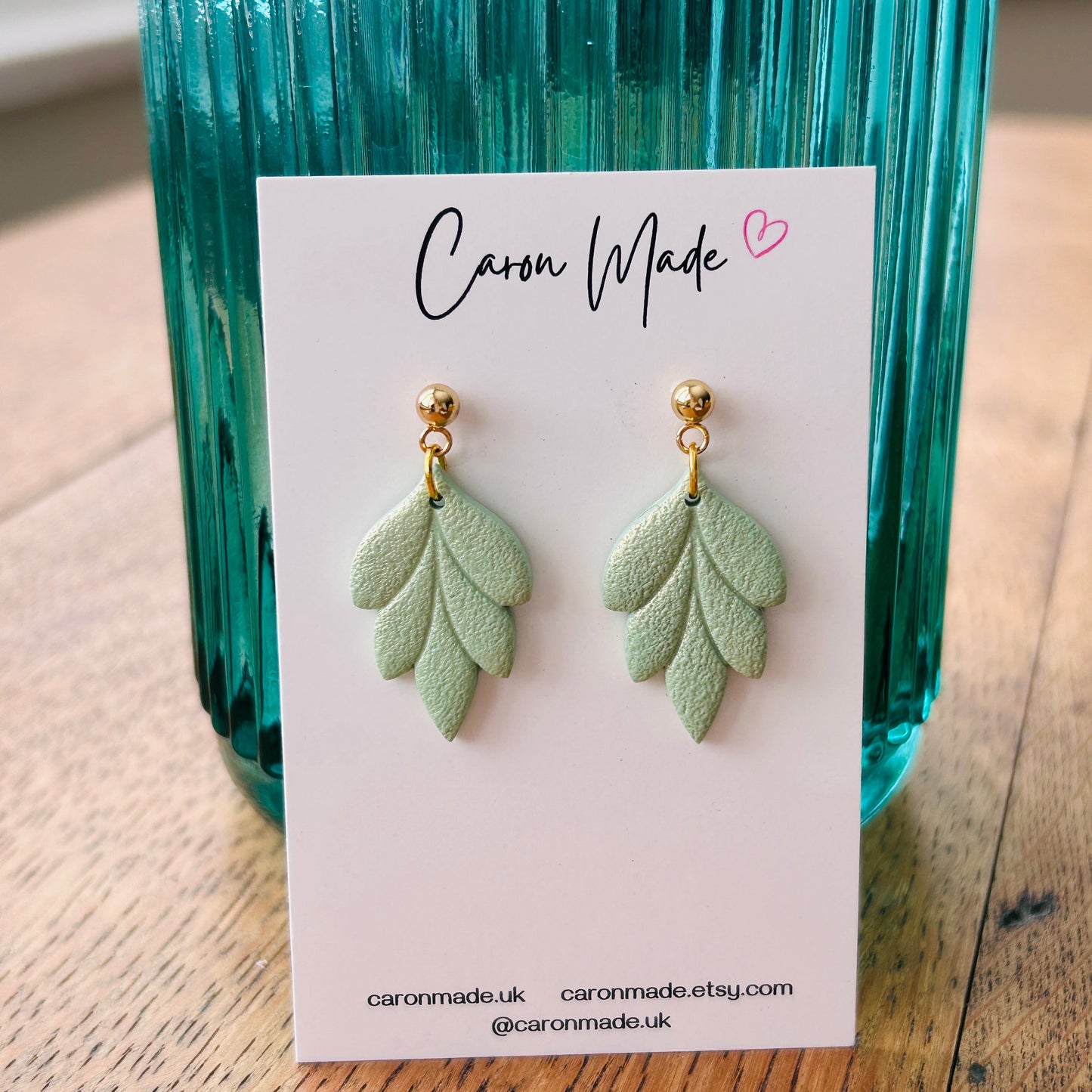 Light green floral shape earrings