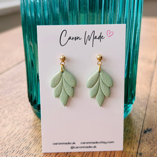 Light green floral shape earrings